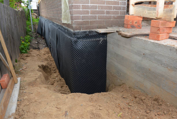 SJ Waterproofing Pros technician performing targeted Vapor Barrier Installation assessment in Oakland, MD